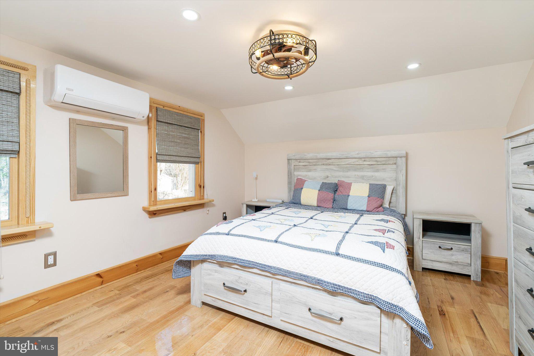 1387 Monmouth Road Mount Holly, NJ 08060 - Photo 27 of 31 a bedroom with a bed and a window