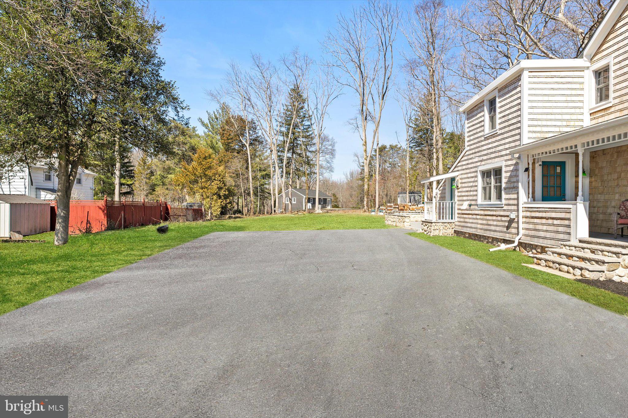 1387 Monmouth Road Mount Holly, NJ 08060 - Photo 30 of 31 a view of a house with a big yard and large tree