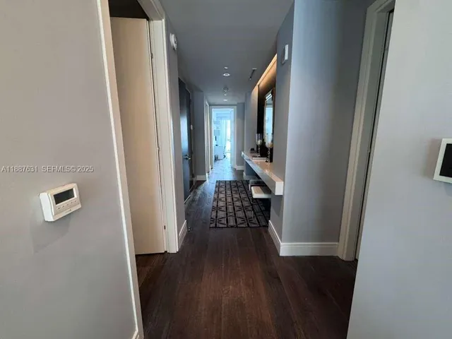 a bed room with a bed and a window