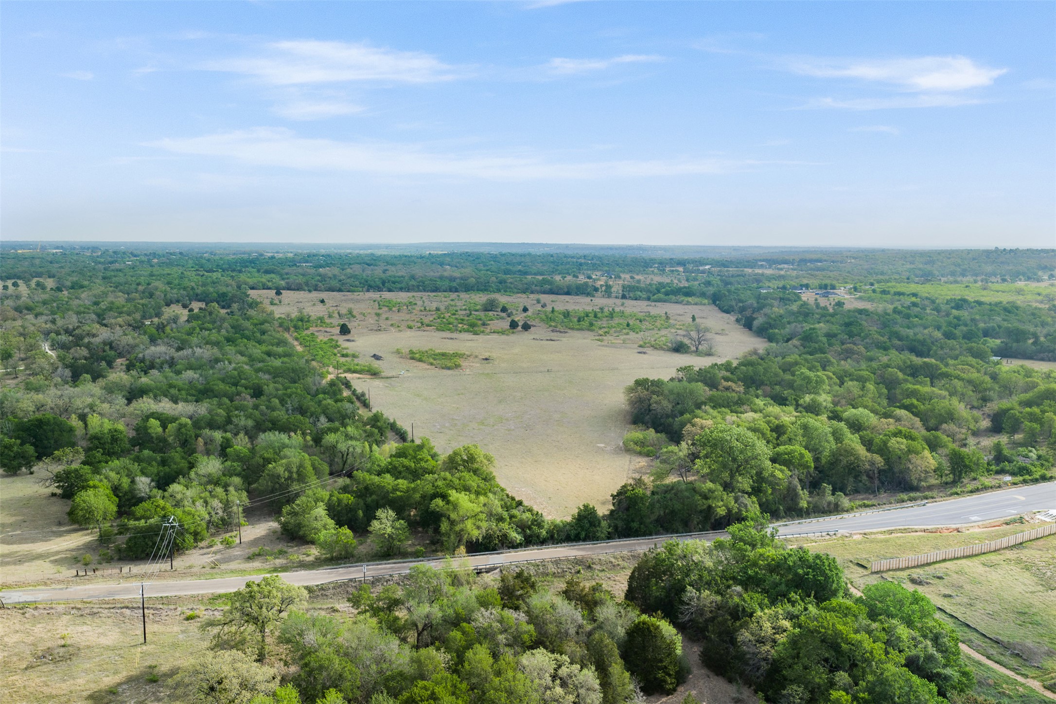 579 Lower Elgin Road Elgin, TX 78621 - Photo 3 of 40 a view of a lake with a city