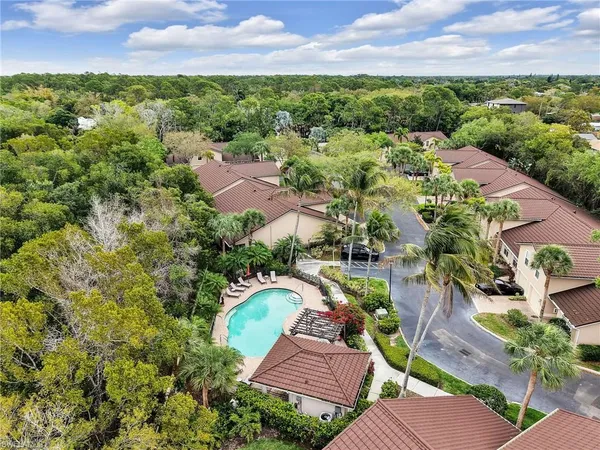 an aerial view of a house with a garden