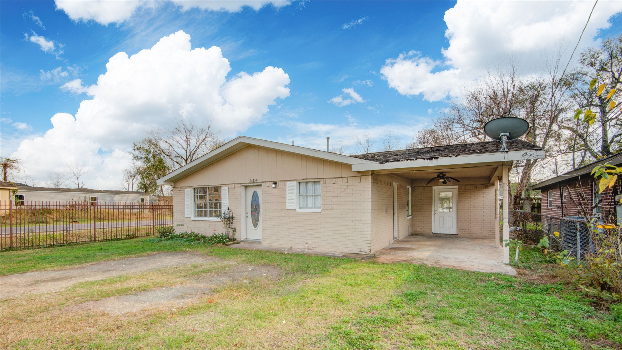 14450 Victoria Street Houston, TX 77015 - Photo 6 of 19 a view of a house with a backyard