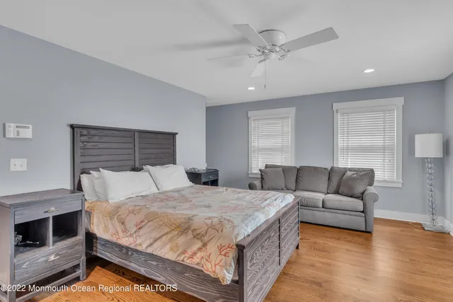 a bed room with a bed and a couch