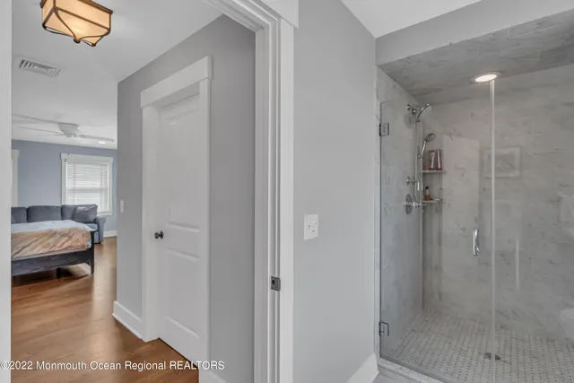 a view of a bedroom from a hallway