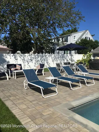 swimming pool view with a outdoor space