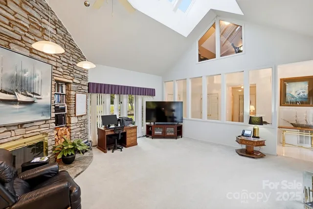 a view of a hallway with a chandelier