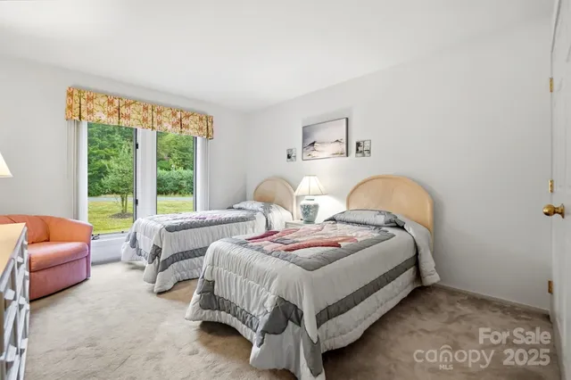 a bathroom with a double vanity sink mirror and bathtub