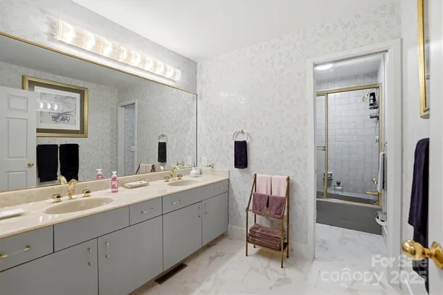 a bed room with a bed and a window