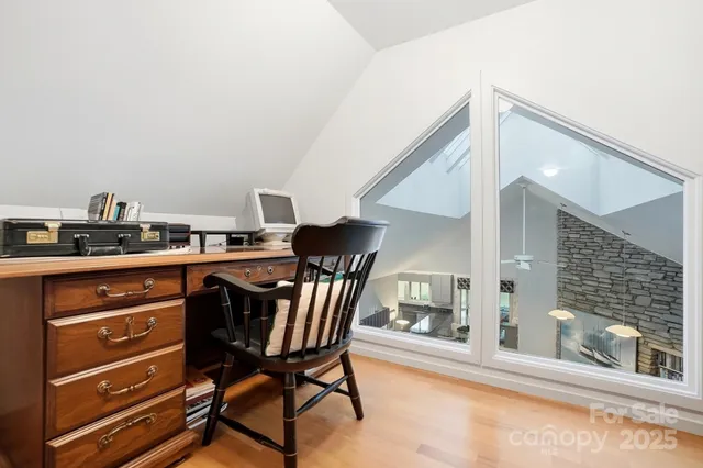 a room with furniture and flat screen tv