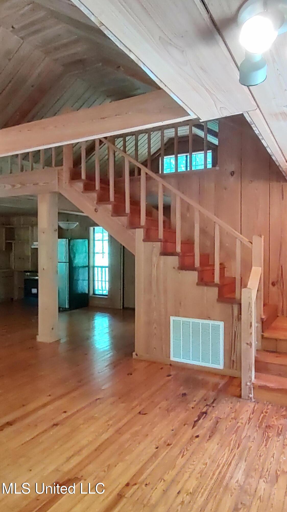 110 Rosenbaum Drive Poplarville, MS 39470 - Photo 12 of 39 Stairs to 2nd loft area