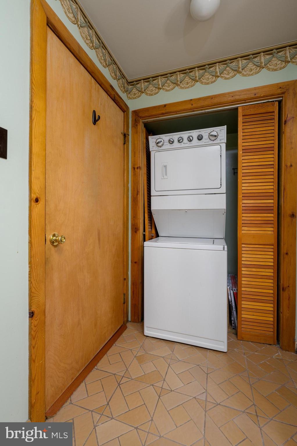 23 South Main Street, Unit 3 Medford, NJ 08055 - Photo 12 of 26 a utility room with dryer and washer