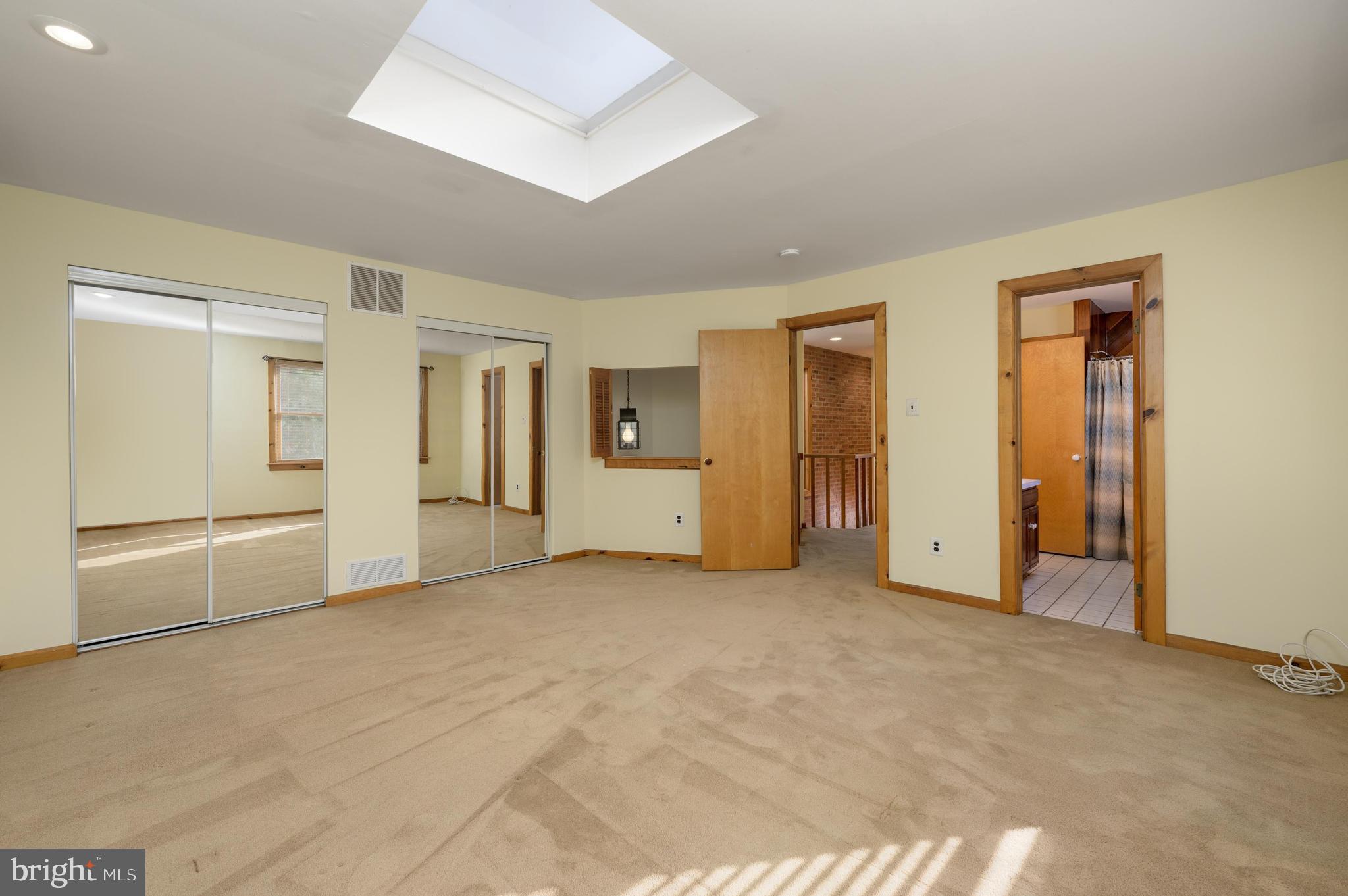 23 South Main Street, Unit 3 Medford, NJ 08055 - Photo 14 of 26 an empty room with closet area