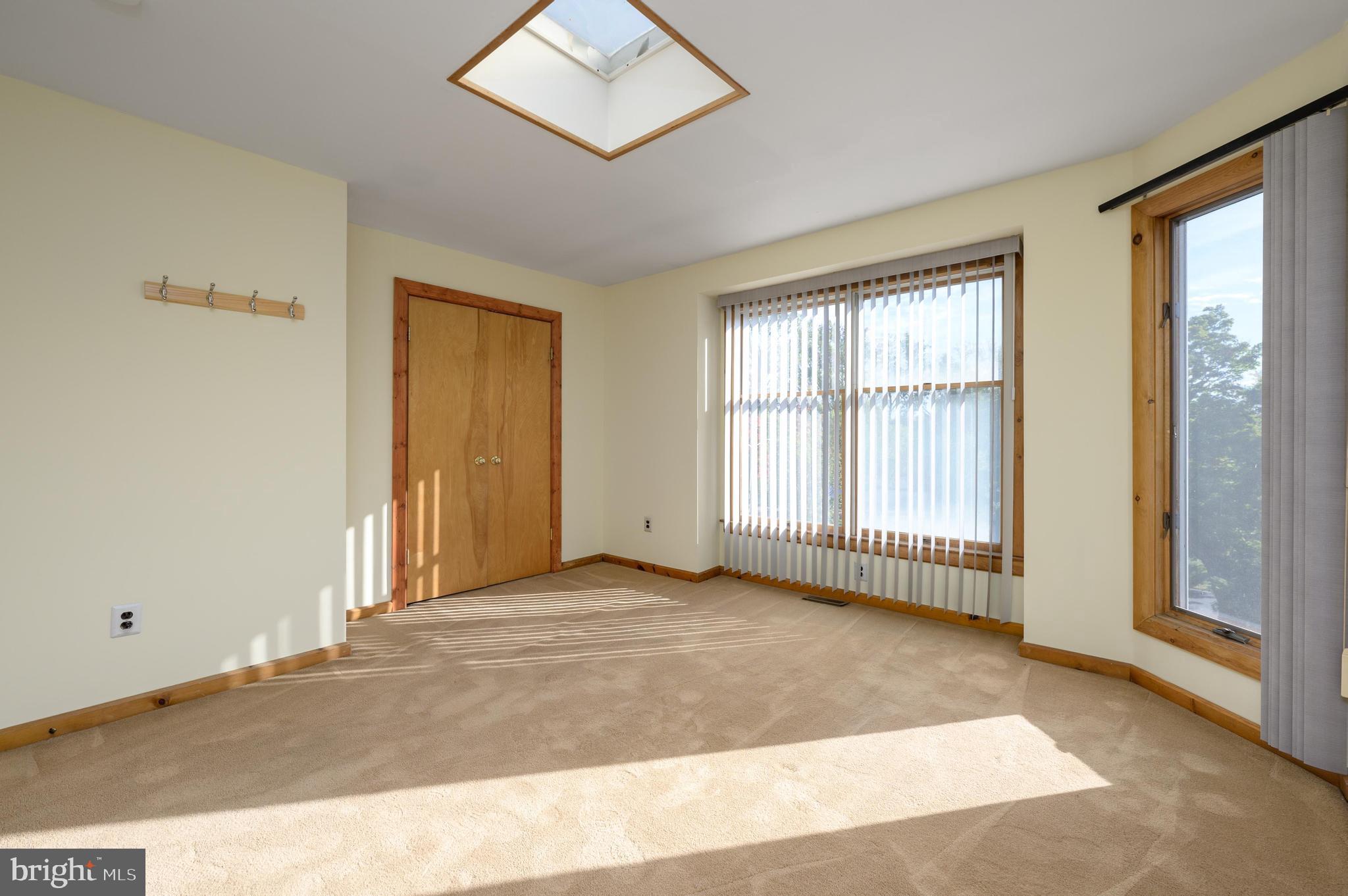 23 South Main Street, Unit 3 Medford, NJ 08055 - Photo 18 of 26 a view of an empty room with a window
