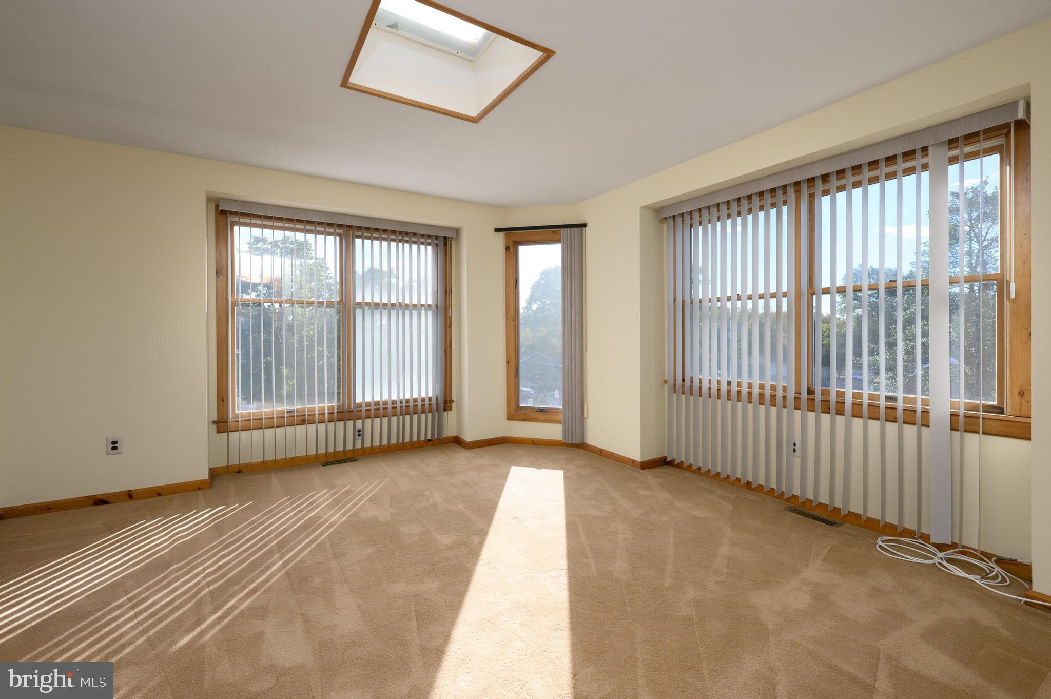 23 South Main Street, Unit 3 Medford, NJ 08055 - Photo 19 of 26 an empty room with windows