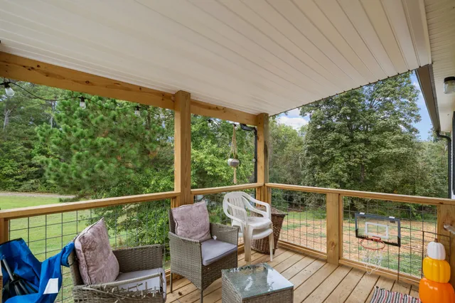 a view of a two chairs in the deck