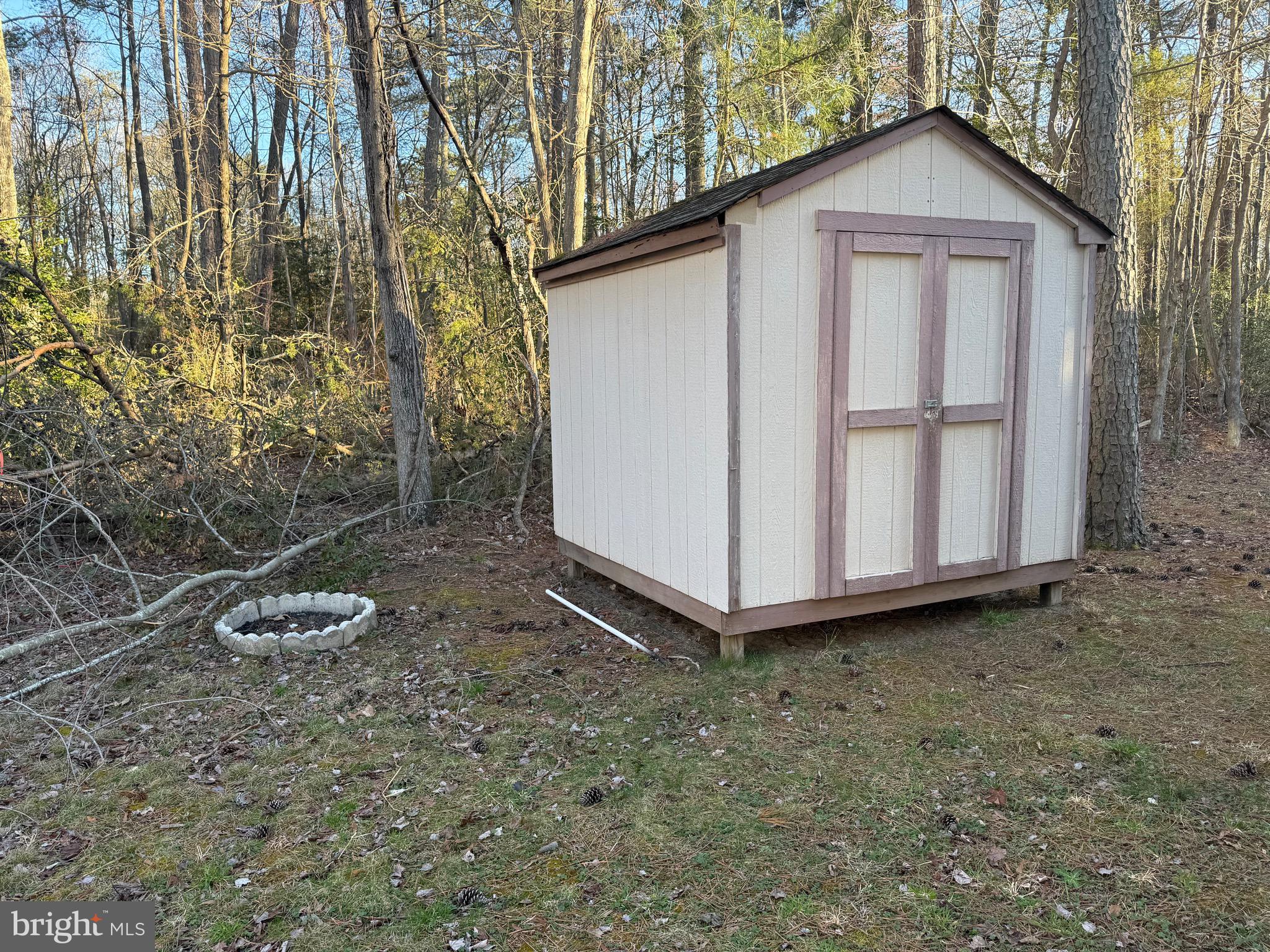 328 12th Street Colonial Beach, VA 22443 - Photo 16 of 19 a backyard of a house
