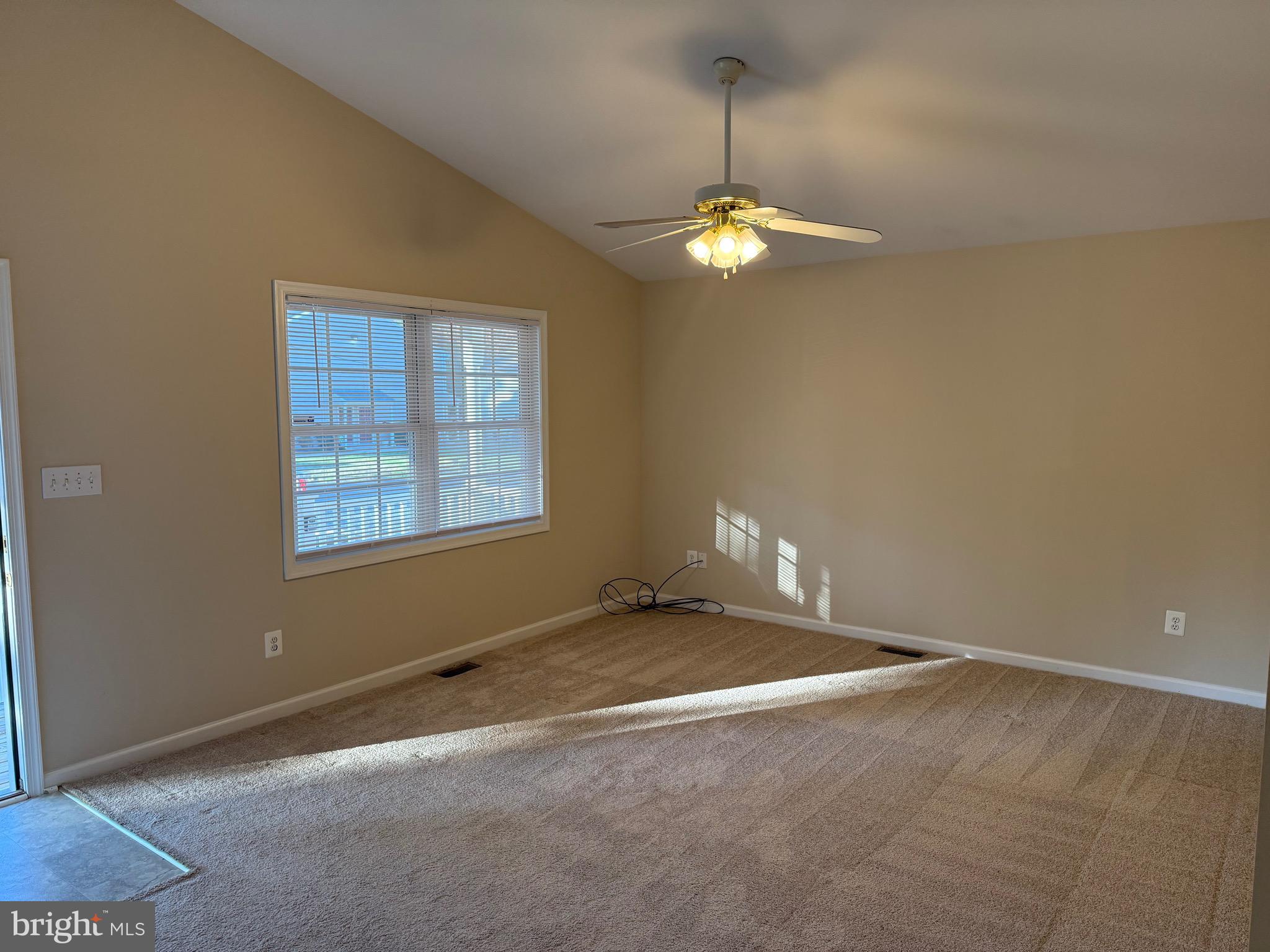 328 12th Street Colonial Beach, VA 22443 - Photo 3 of 19 a view of an empty room with a window