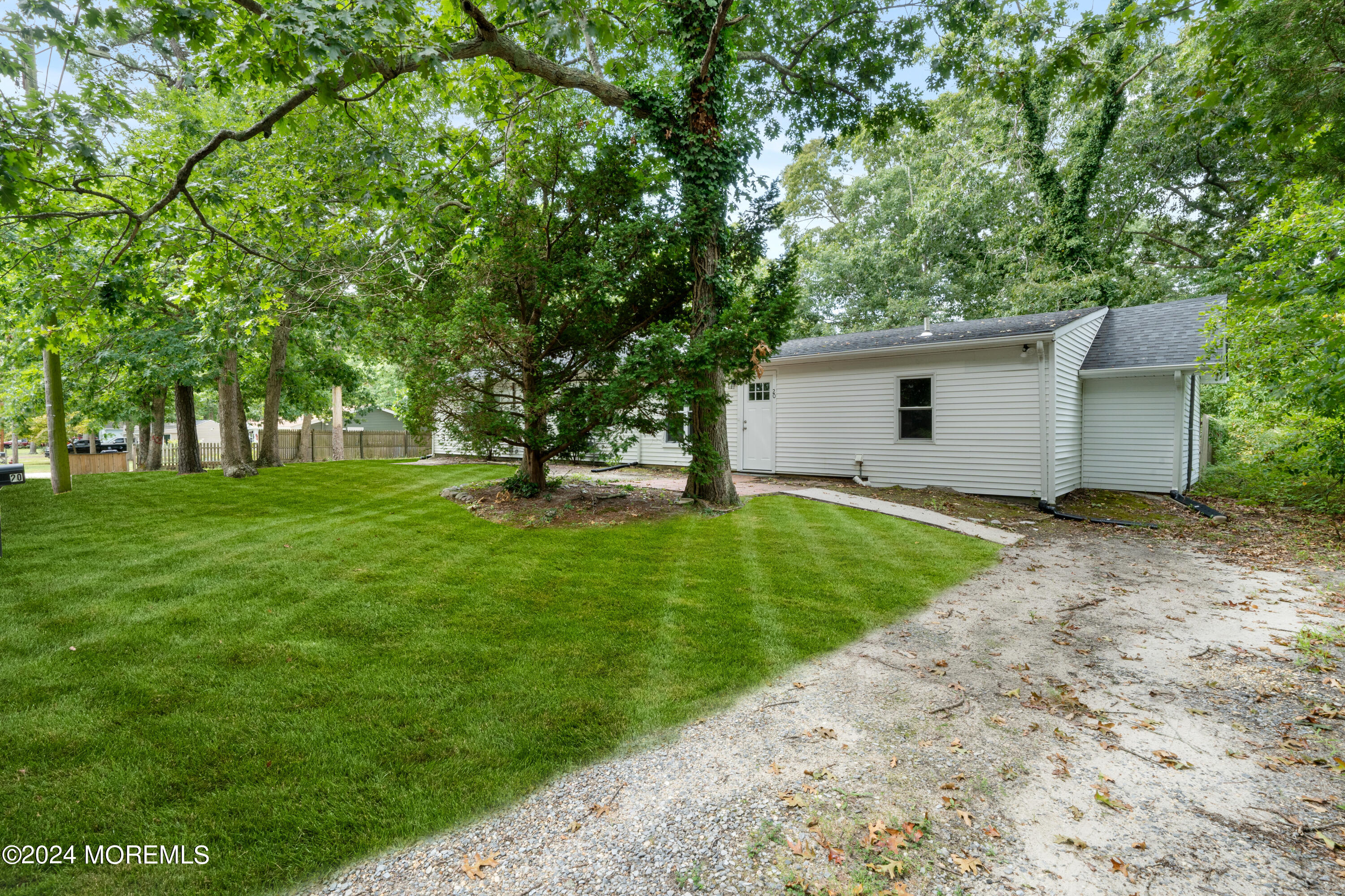 a view of a backyard with a garden
