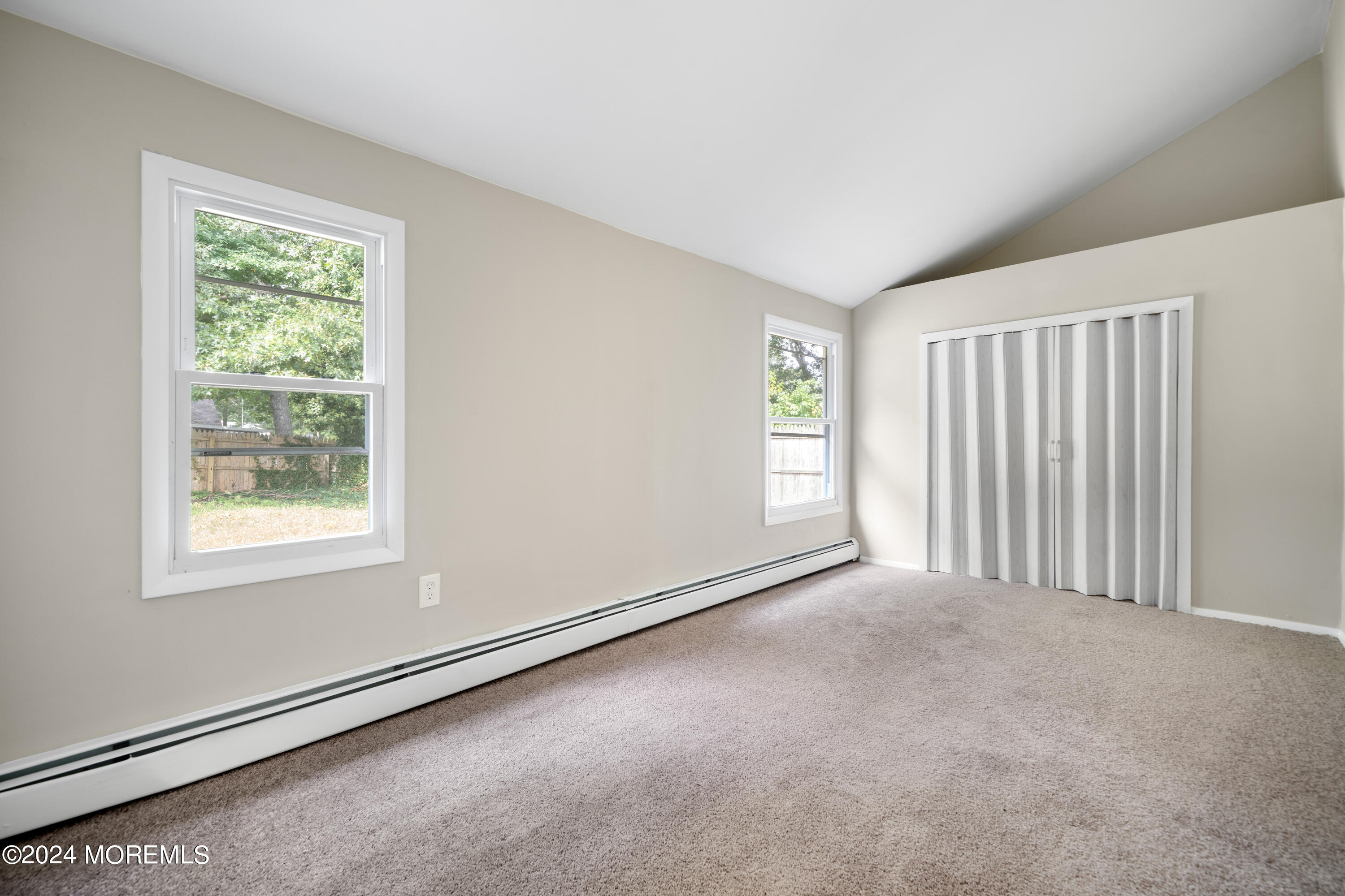 20 Willow Street Waretown, NJ 08758 - Photo 13 of 22 an empty room with windows