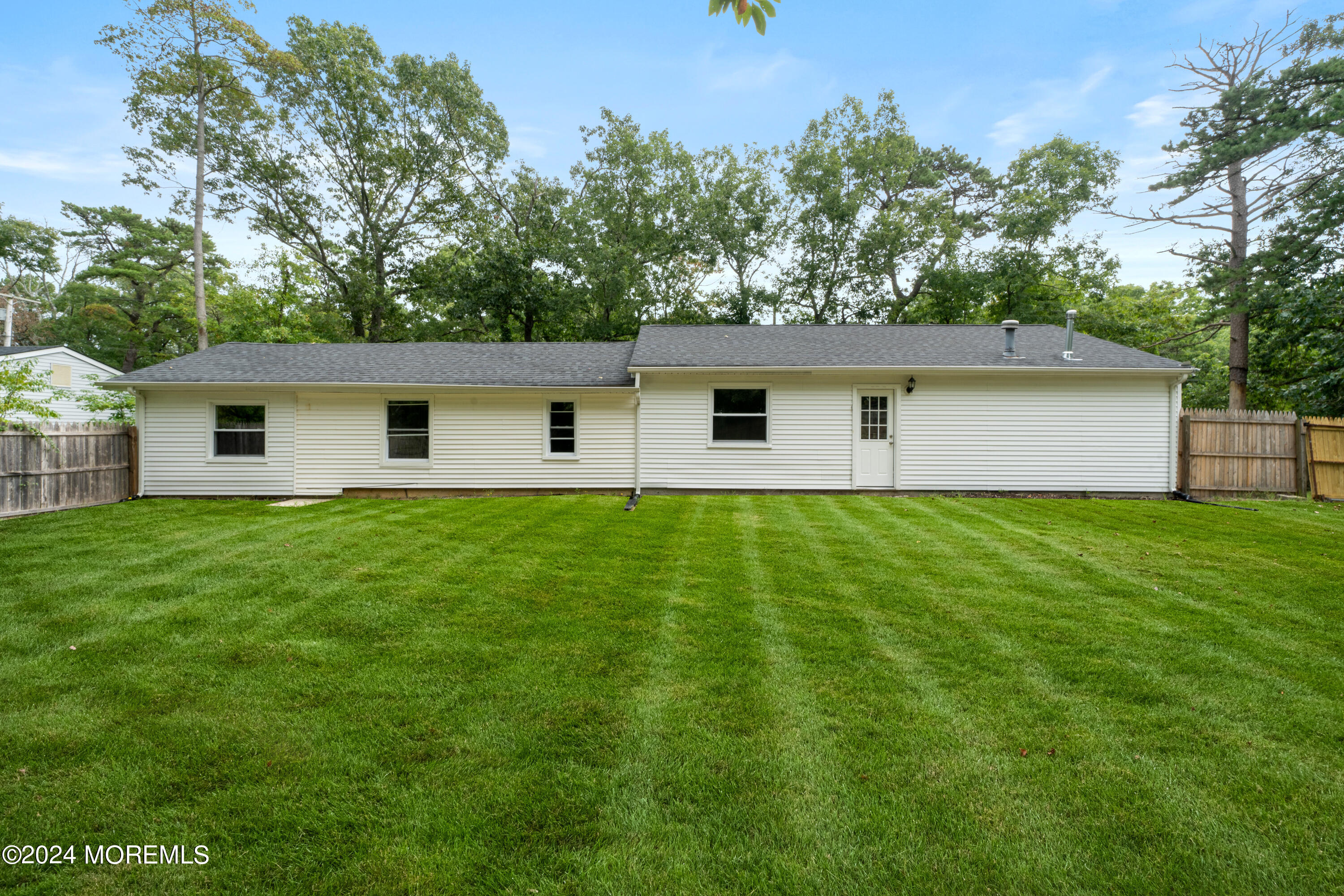 20 Willow Street Waretown, NJ 08758 - Photo 21 of 22 a front view of house with a garden