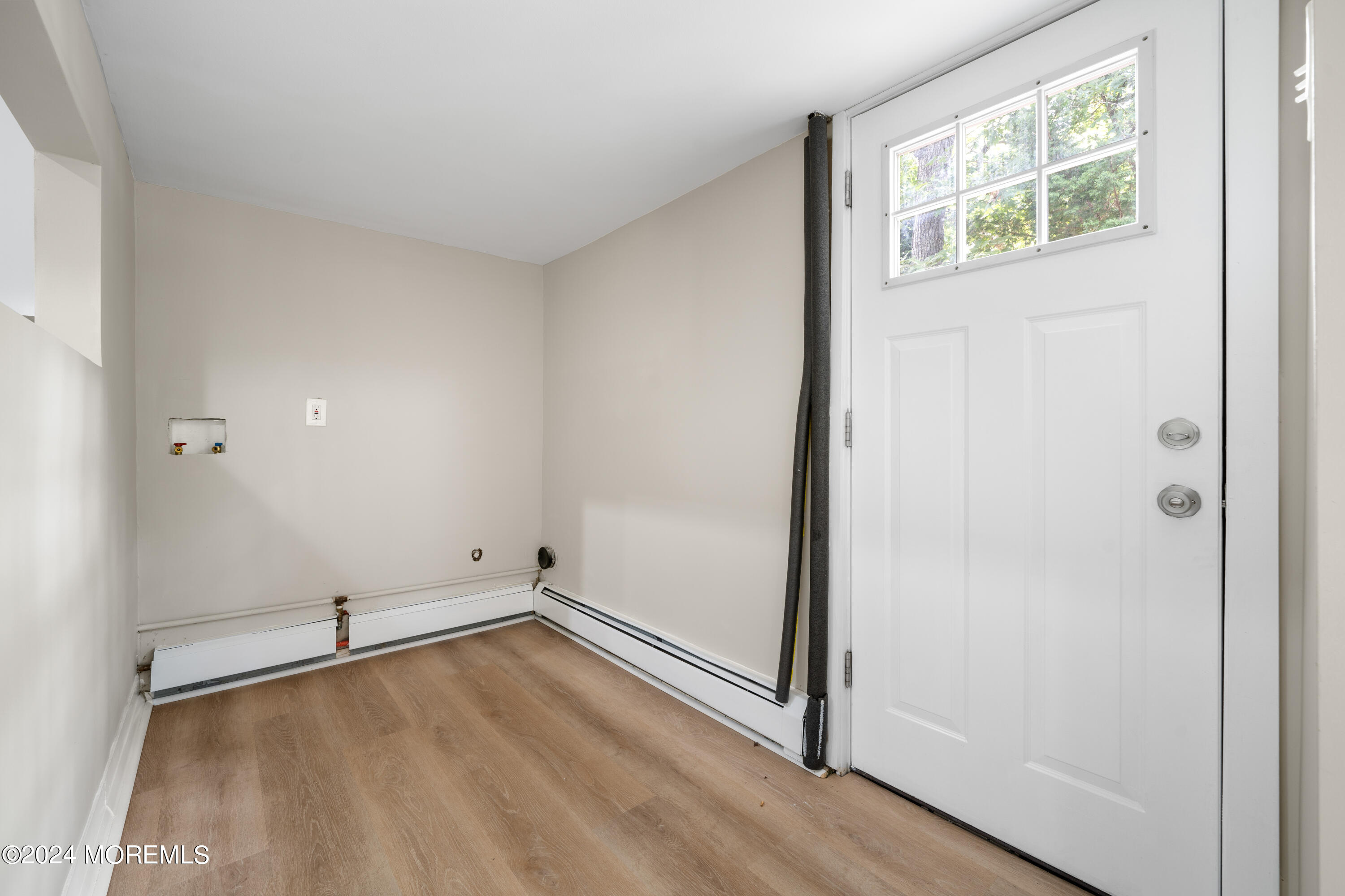 20 Willow Street Waretown, NJ 08758 - Photo 5 of 22 an empty room with a window