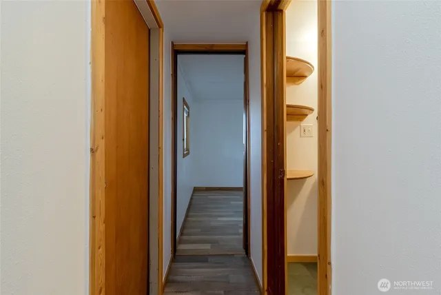 a view of a bathroom from a hallway
