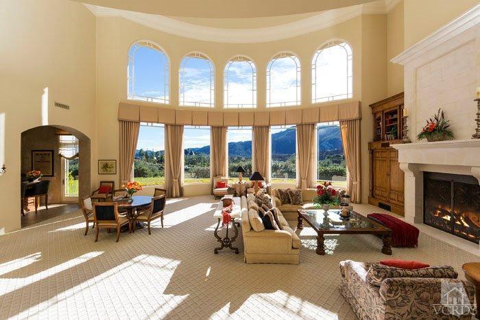 2300 White Stallion Road Thousand Oaks, CA 91361 - Photo 15 of 86 a living room with furniture and floor to ceiling windows