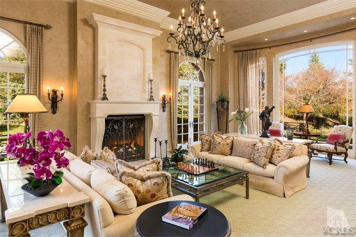 2300 White Stallion Road Thousand Oaks, CA 91361 - Photo 29 of 86 a living room with furniture and a chandelier