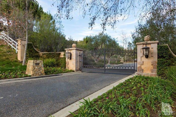 2300 White Stallion Road Thousand Oaks, CA 91361 - Photo 4 of 86 a view of a street with a house in the background