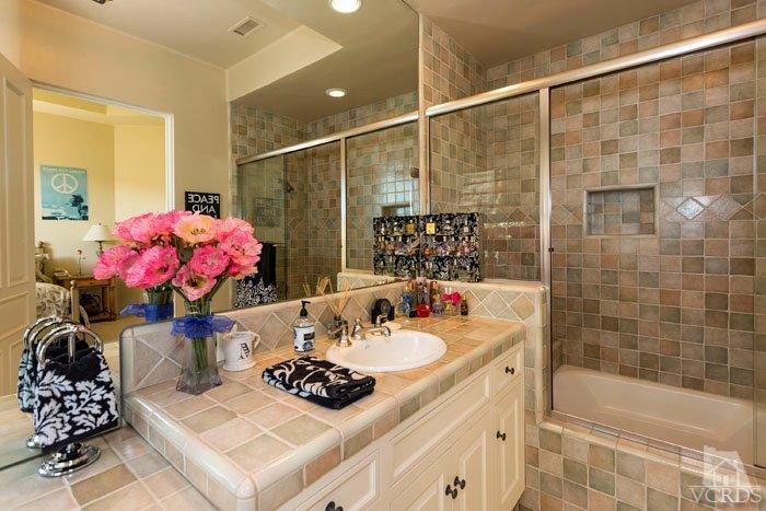 2300 White Stallion Road Thousand Oaks, CA 91361 - Photo 33 of 86 a bathroom with a sink mirror and shower