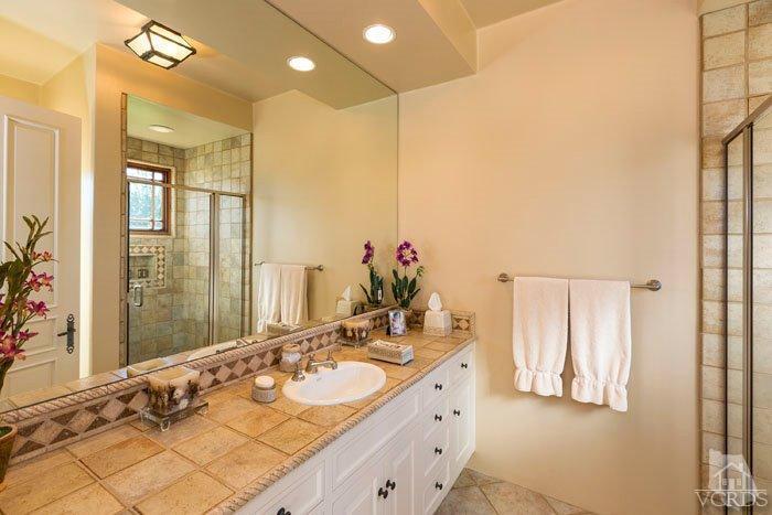 2300 White Stallion Road Thousand Oaks, CA 91361 - Photo 37 of 86 a bathroom with a double vanity sink mirror and double