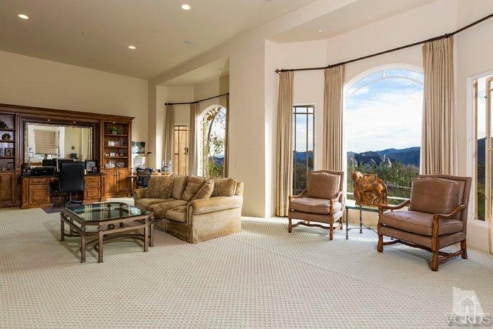 2300 White Stallion Road Thousand Oaks, CA 91361 - Photo 50 of 86 a living room with furniture and large windows