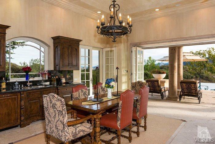 2300 White Stallion Road Thousand Oaks, CA 91361 - Photo 73 of 86 a dining room with furniture a chandelier and window