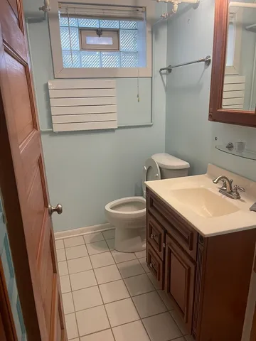 a stove top oven sitting inside of a kitchen