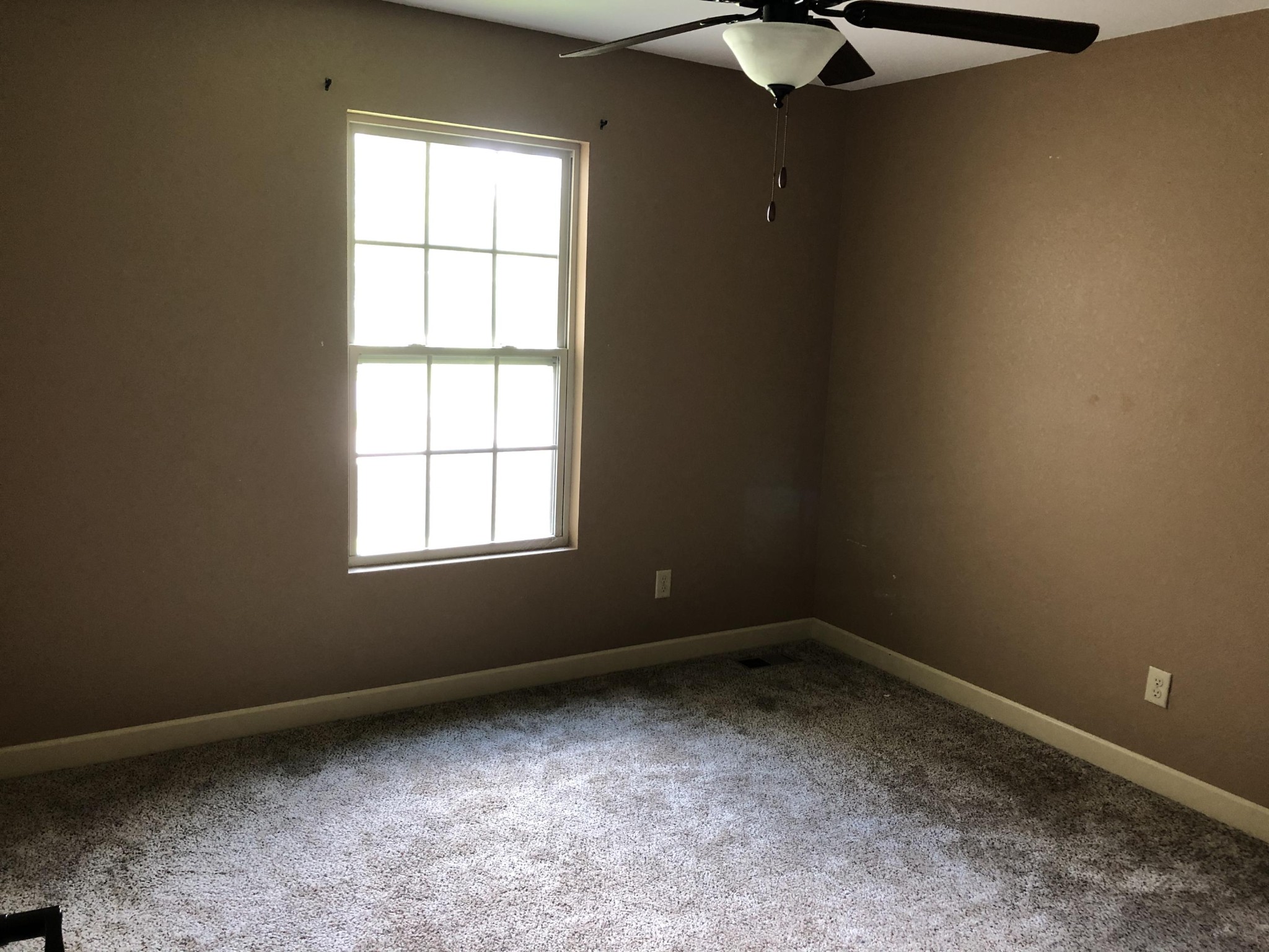 125 Timber Creek Road Maynardville, TN 37807 - Photo 8 of 18 an empty room with a window