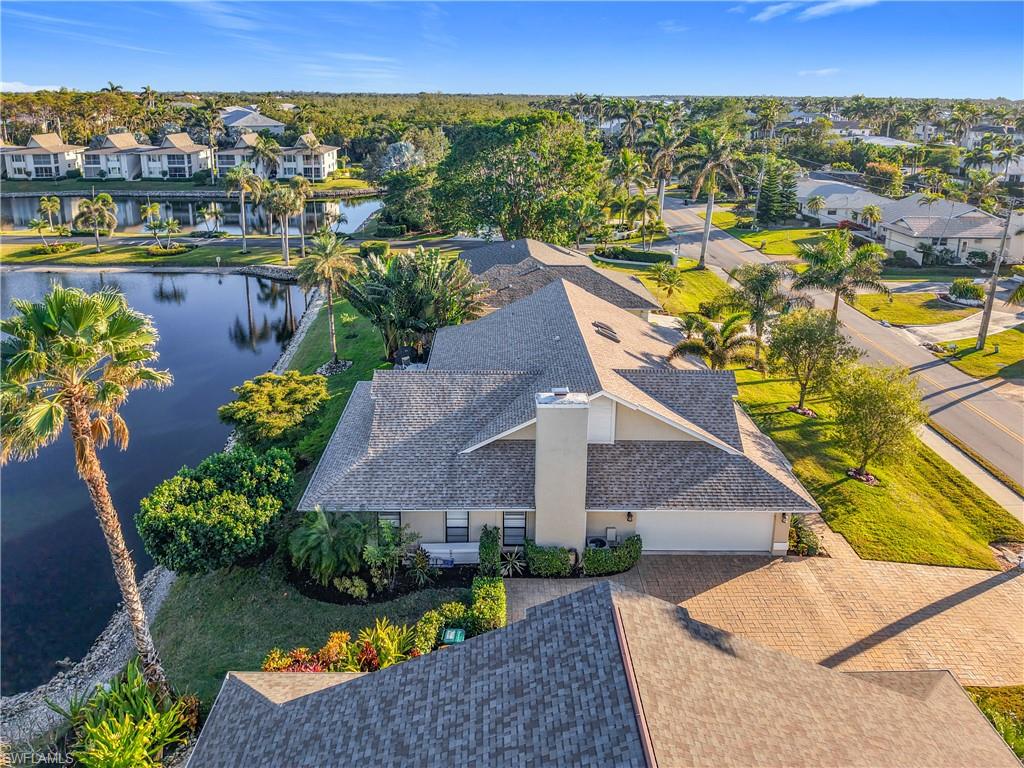 1659 Sandpiper Street, Unit E Naples, FL 34112 - Photo 45 of 50 a view of a city with lawn chairs