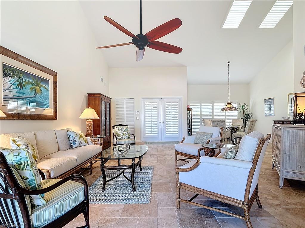 1659 Sandpiper Street, Unit E Naples, FL 34112 - Photo 10 of 50 a living room with furniture