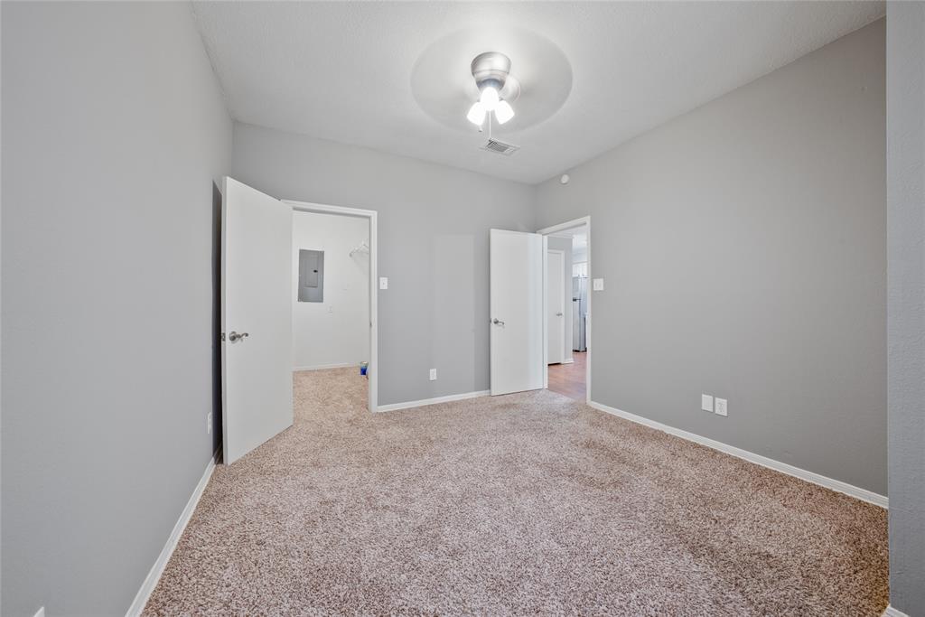 8545 Midpark Road, Unit 47 Dallas, TX 75240 - Photo 8 of 10 wooden floor in an empty room