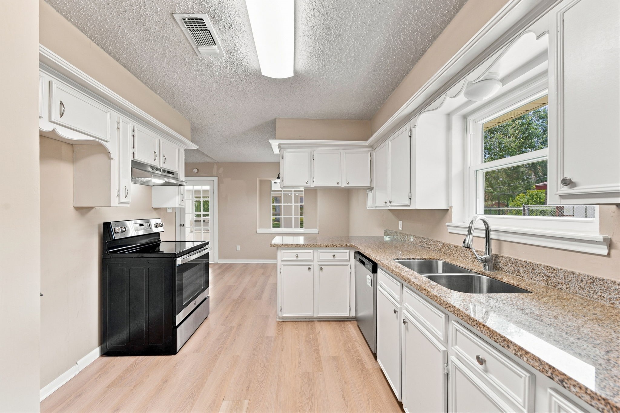 13317 Rene Circle Santa Fe, TX 77510 - Photo 13 of 35 Kitchen to dining area