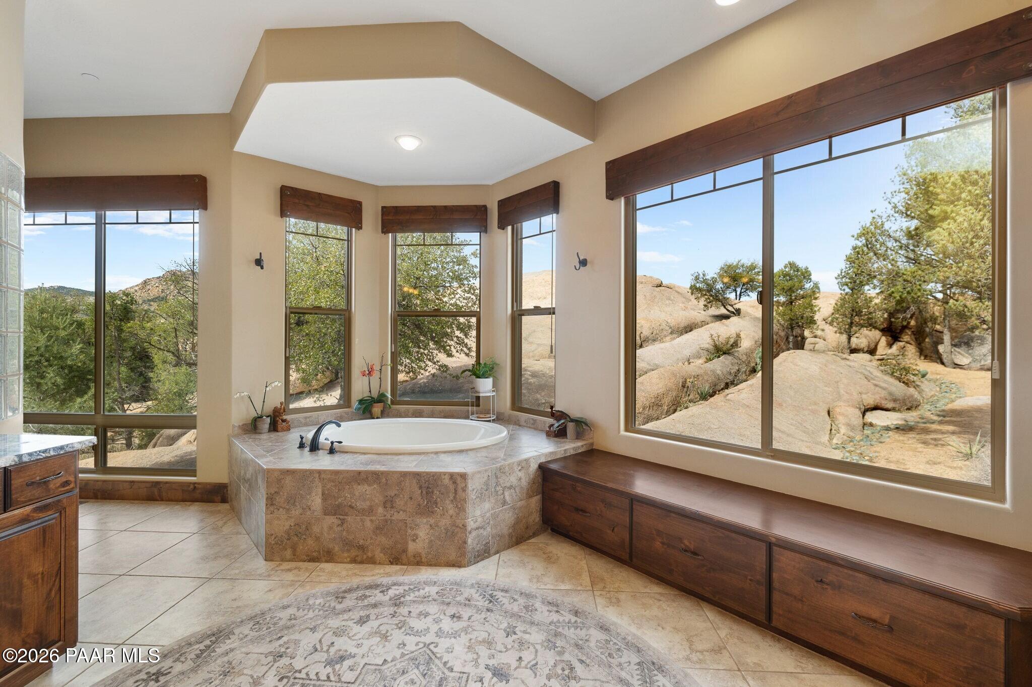 4290 Fort Bridger Road Prescott, AZ 86305 - Photo 19 of 50 a spacious bathroom with a tub and large window