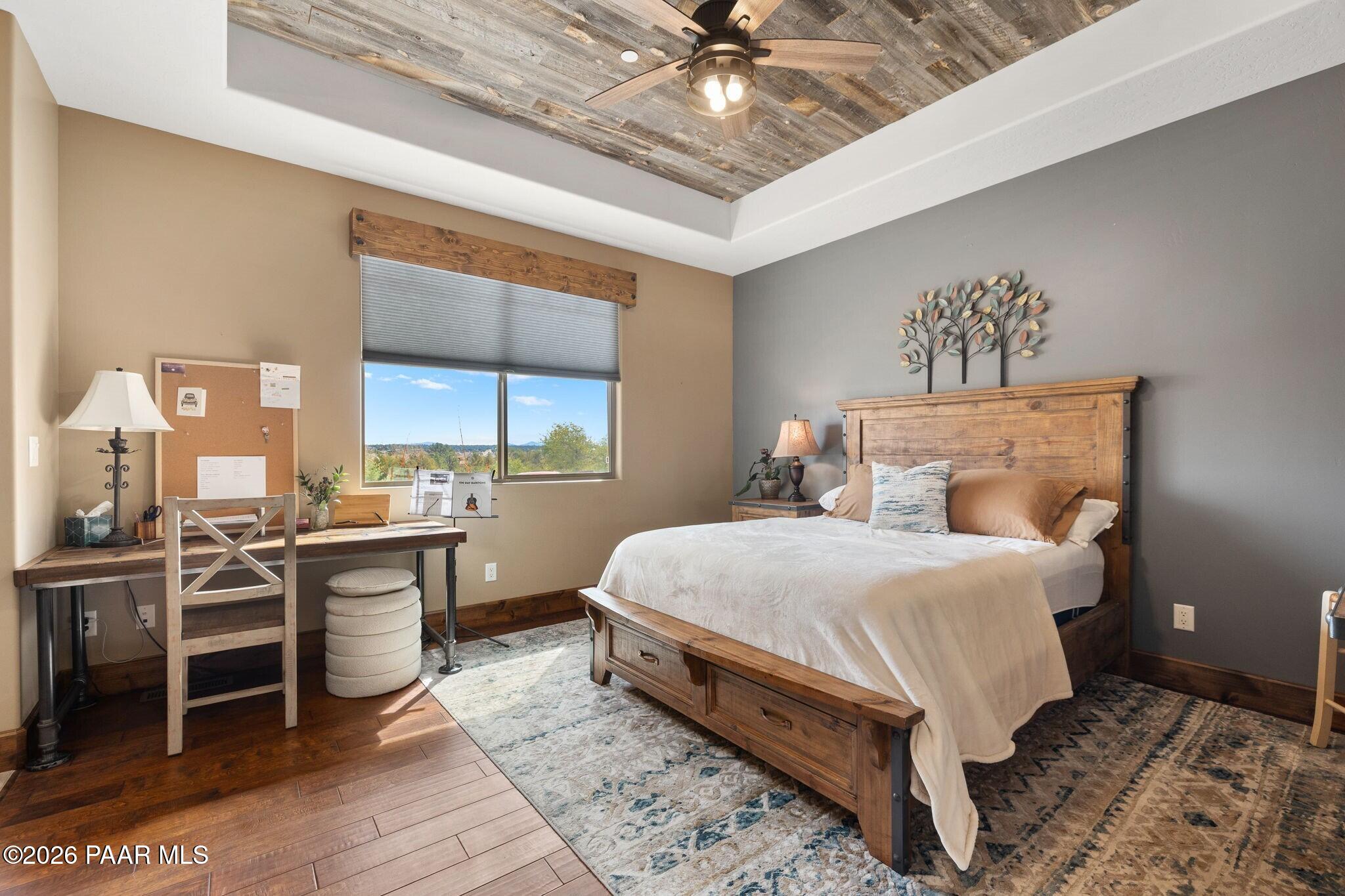 4290 Fort Bridger Road Prescott, AZ 86305 - Photo 21 of 50 a bedroom with a large bed and a window