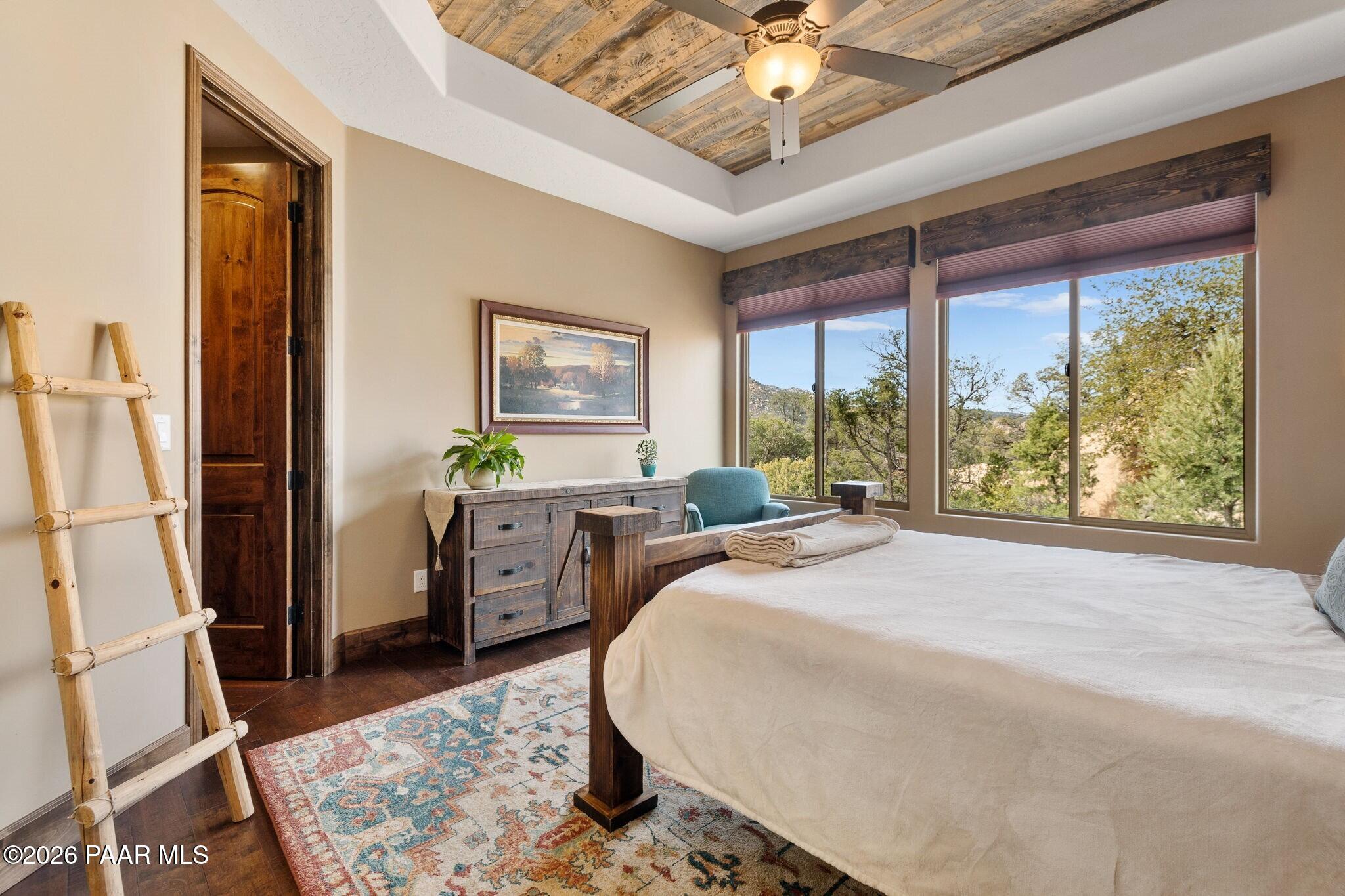 4290 Fort Bridger Road Prescott, AZ 86305 - Photo 24 of 50 a bed room with a bed and a window