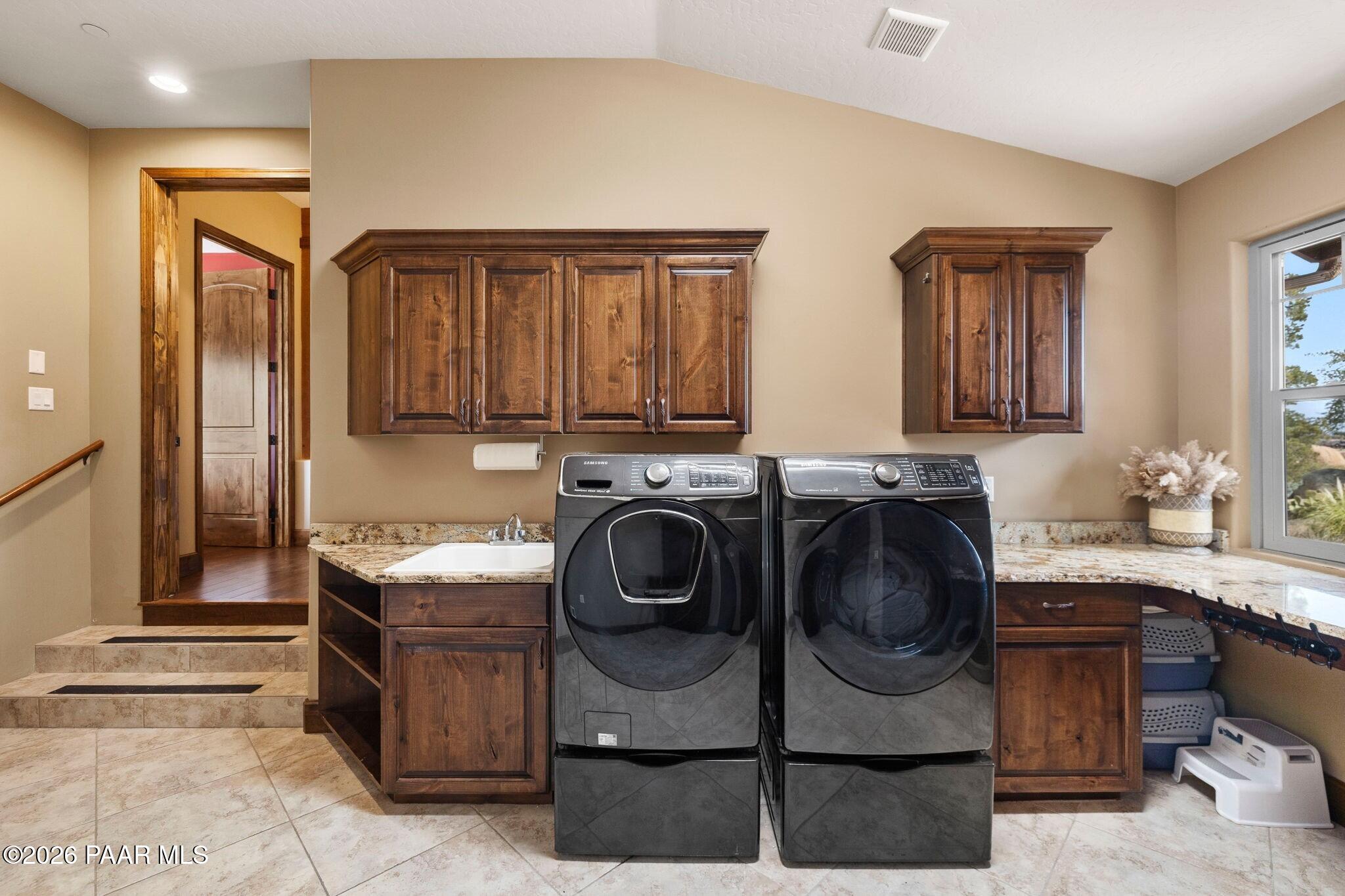 4290 Fort Bridger Road Prescott, AZ 86305 - Photo 30 of 50 a utility room with sink dryer and washer