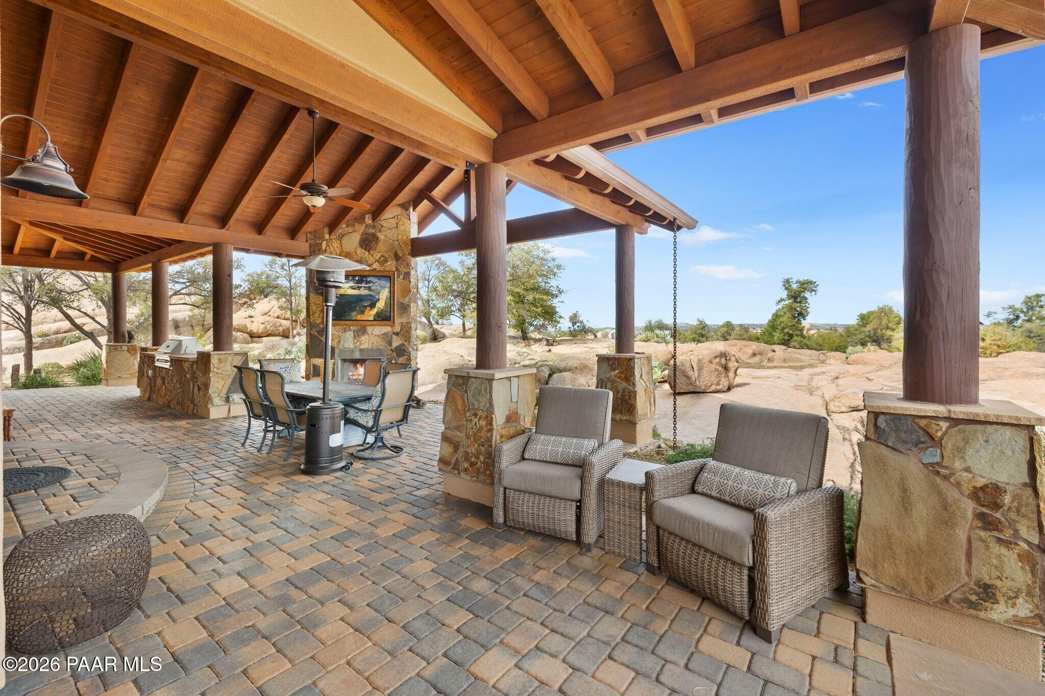 4290 Fort Bridger Road Prescott, AZ 86305 - Photo 33 of 50 a balcony with furniture and a ceiling fan