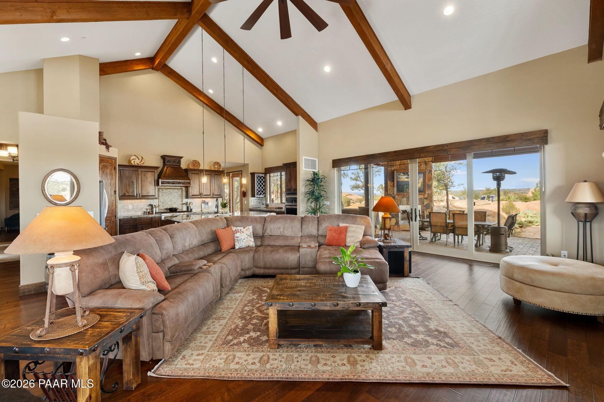 4290 Fort Bridger Road Prescott, AZ 86305 - Photo 10 of 50 a living room with furniture and a chandelier