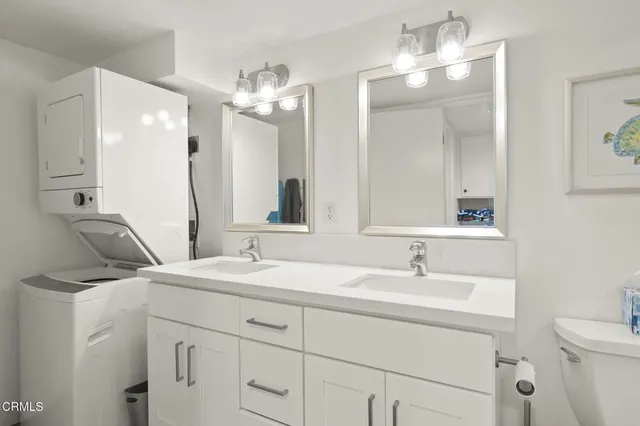 a bedroom with a bed and a table in it