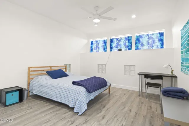 a view of a terrace with a lawn chairs