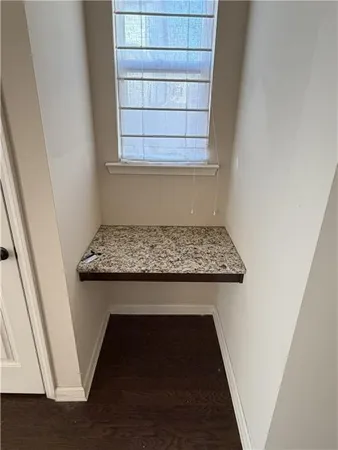a kitchen with stainless steel appliances a sink stove and cabinets