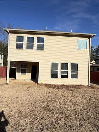 an empty room with wooden floor