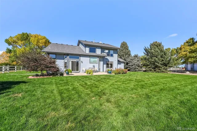 a view of a garage with a car and car parked